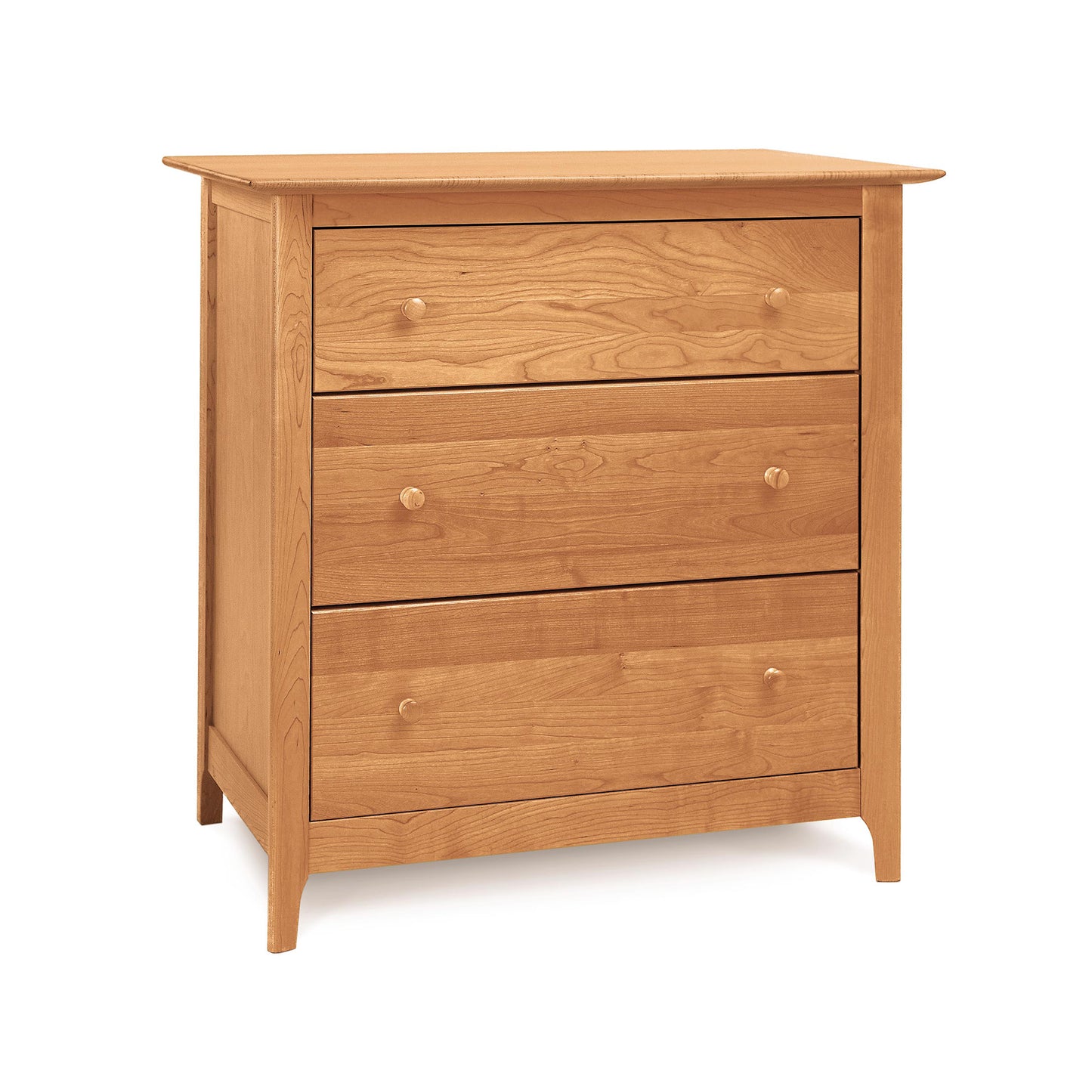 A handmade, wooden Sarah 3-Drawer Chest in natural cherry wood on a white background by Copeland Furniture.