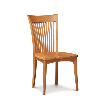 A Sarah Shaker Cherry Chair with Wooden Seat from Copeland Furniture, with vertical slats on its backrest, standing isolated against a white background.