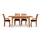A modern Copeland Furniture Sarah Shaker Tapered Leg Extension Table dining set with four chairs on a plain background.