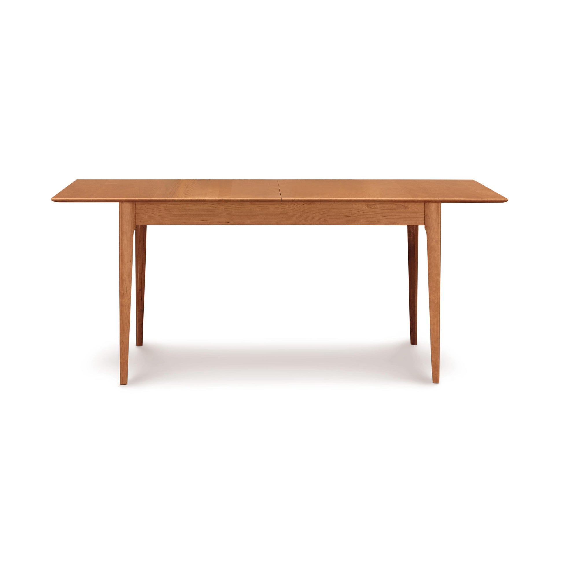 Sarah Shaker Tapered Leg Extension Table by Copeland Furniture featuring elegant tapered legs and a smooth, contemporary wood finish.