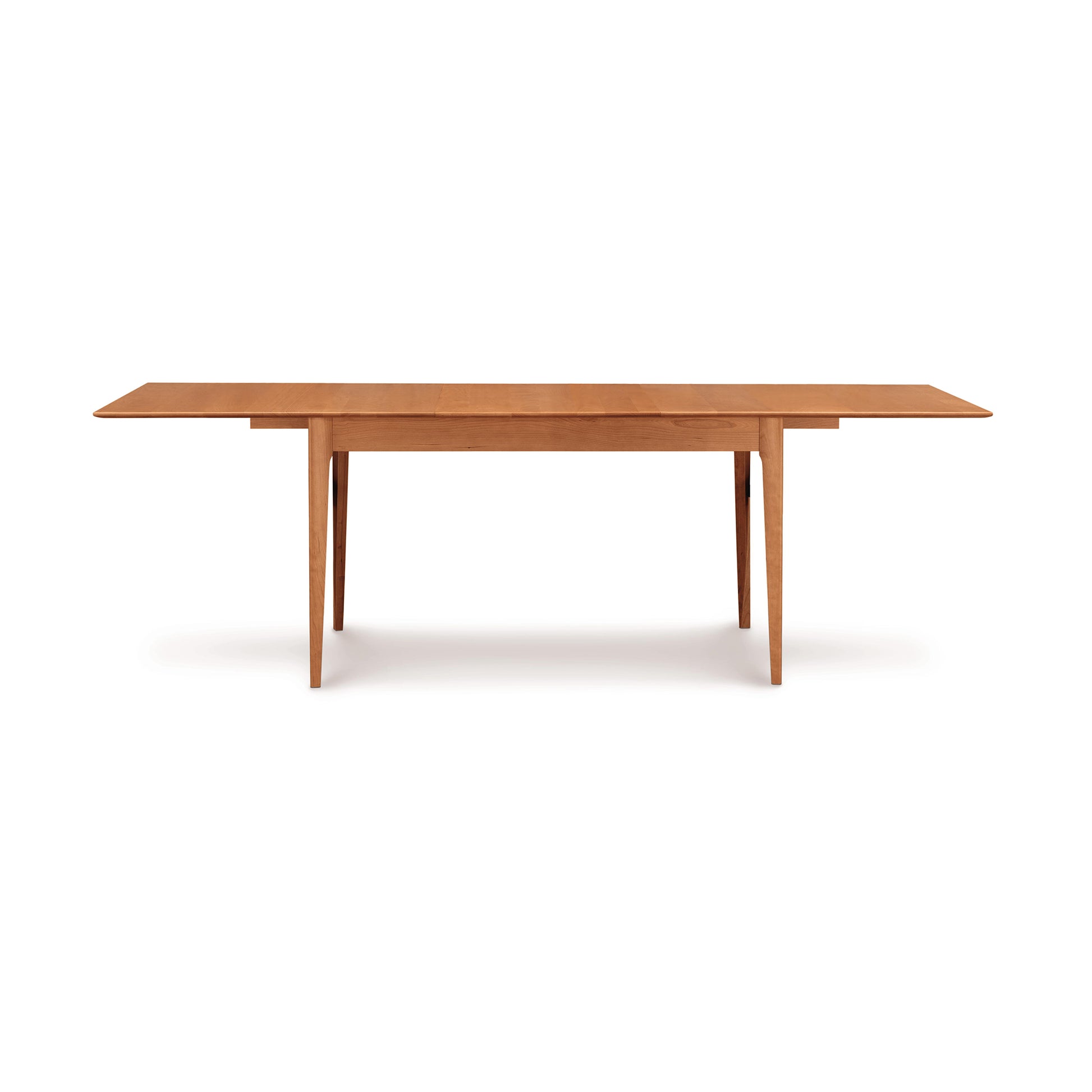 Sarah Shaker Tapered Leg Extension Table by Copeland Furniture featuring clean lines and elegant tapered legs, crafted from solid wood.