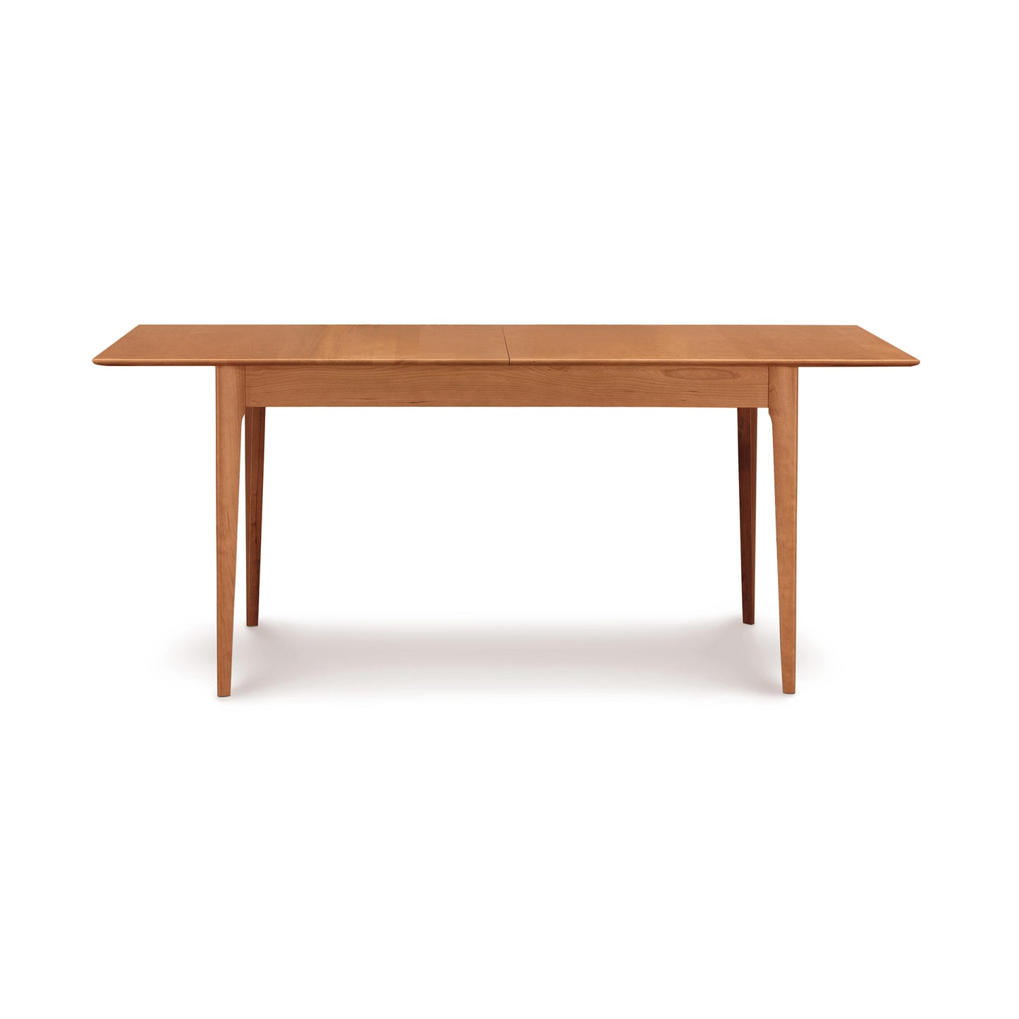 A Sarah Shaker Tapered Leg Extension Table from the Copeland Furniture dining room collection, isolated on a white background.