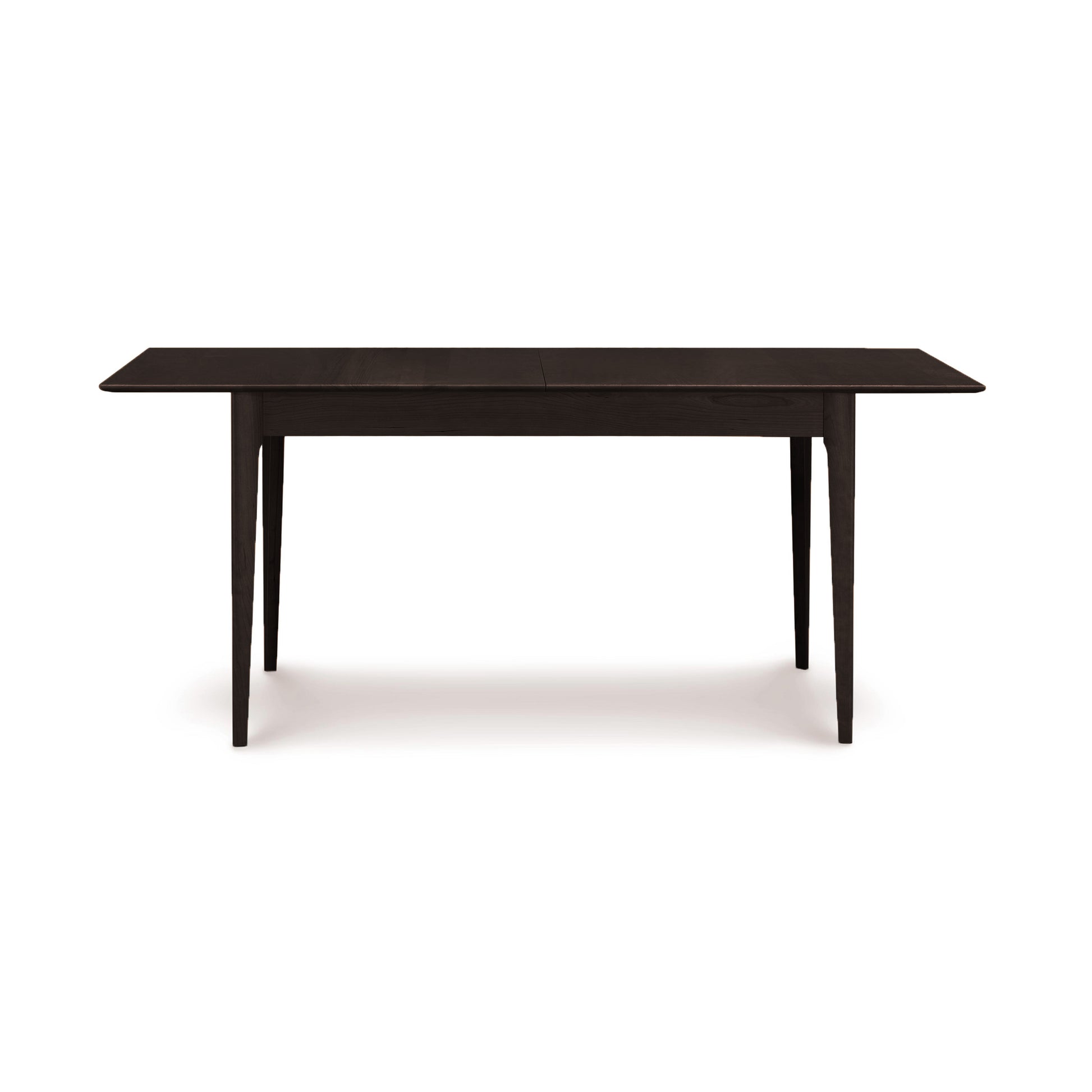 Copeland Furniture Sarah Shaker Tapered Leg Extension Table in dark wood, highlighting its classic design and elegant tapered legs.