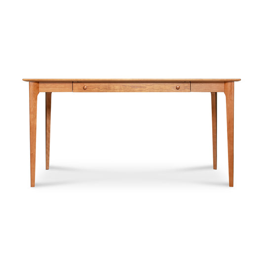 Sarah Large Desk by Copeland Furniture features a rectangular shape, tapered legs, and drawers; expertly handcrafted in Vermont using quality materials.