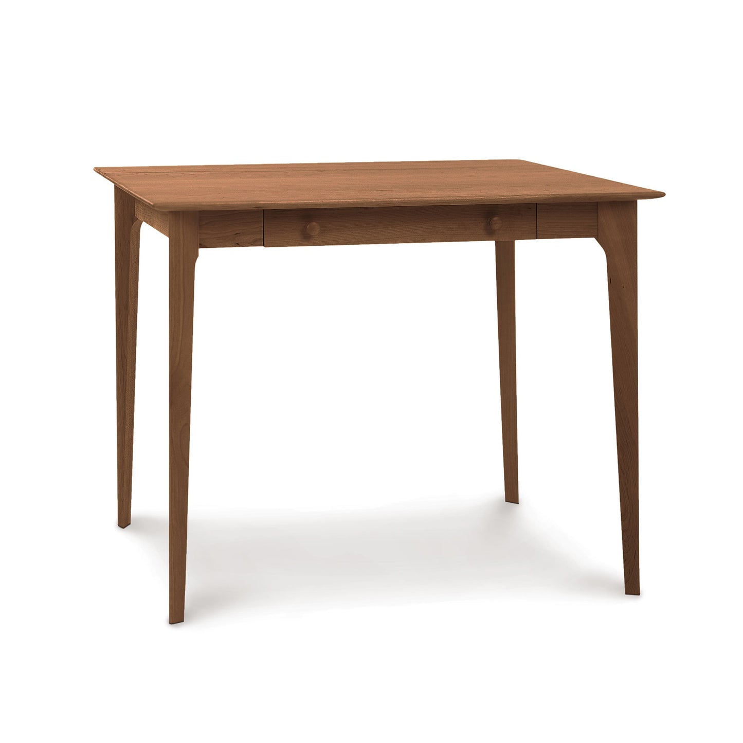 A solid wood Sarah Secretary Desk by Copeland Furniture with a rectangular top and tapered legs, featuring a simple design with a drawer, against a white background.