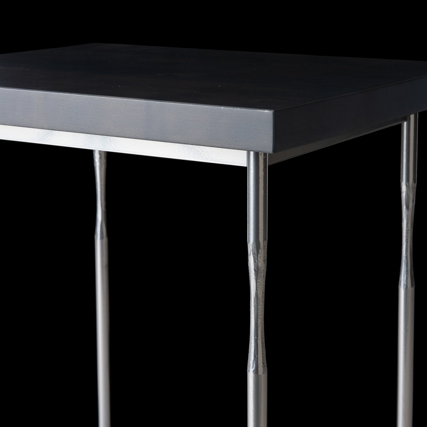 Hubbardton Forge Senza Wood Top Side Table featuring slender metal legs, showcasing its modern design.