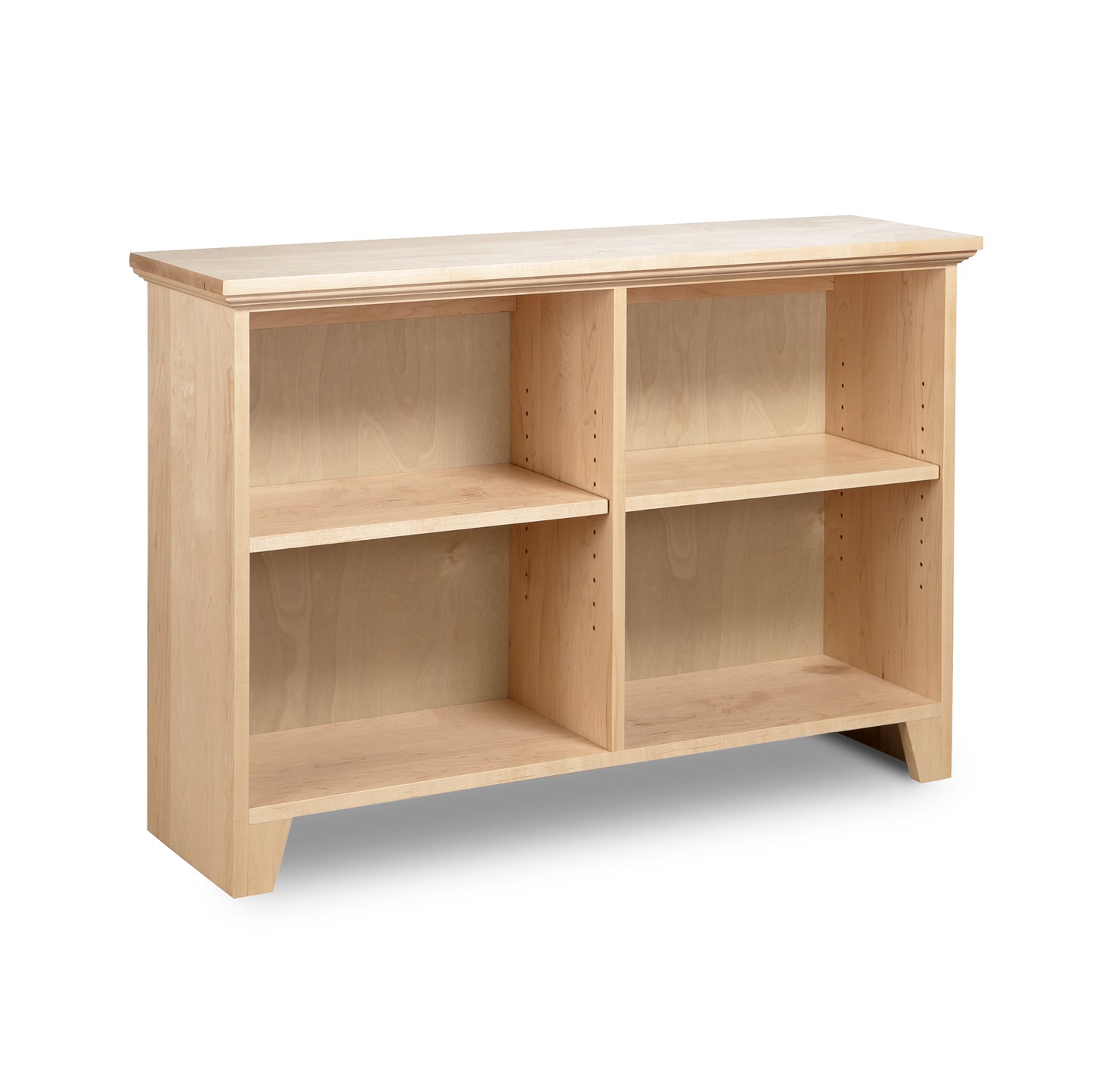 Shaker Wide Bookcase by Lyndon Furniture showcasing two adjustable shelves, four spacious sections, and a stunning light-wood finish.