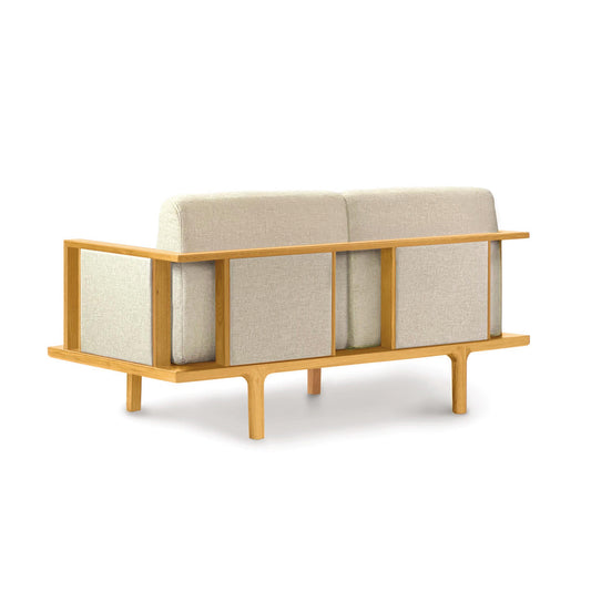 Sierra Upholstered Loveseat by Copeland Furniture; elegant beige design with plush custom panels, showcasing its contemporary style.