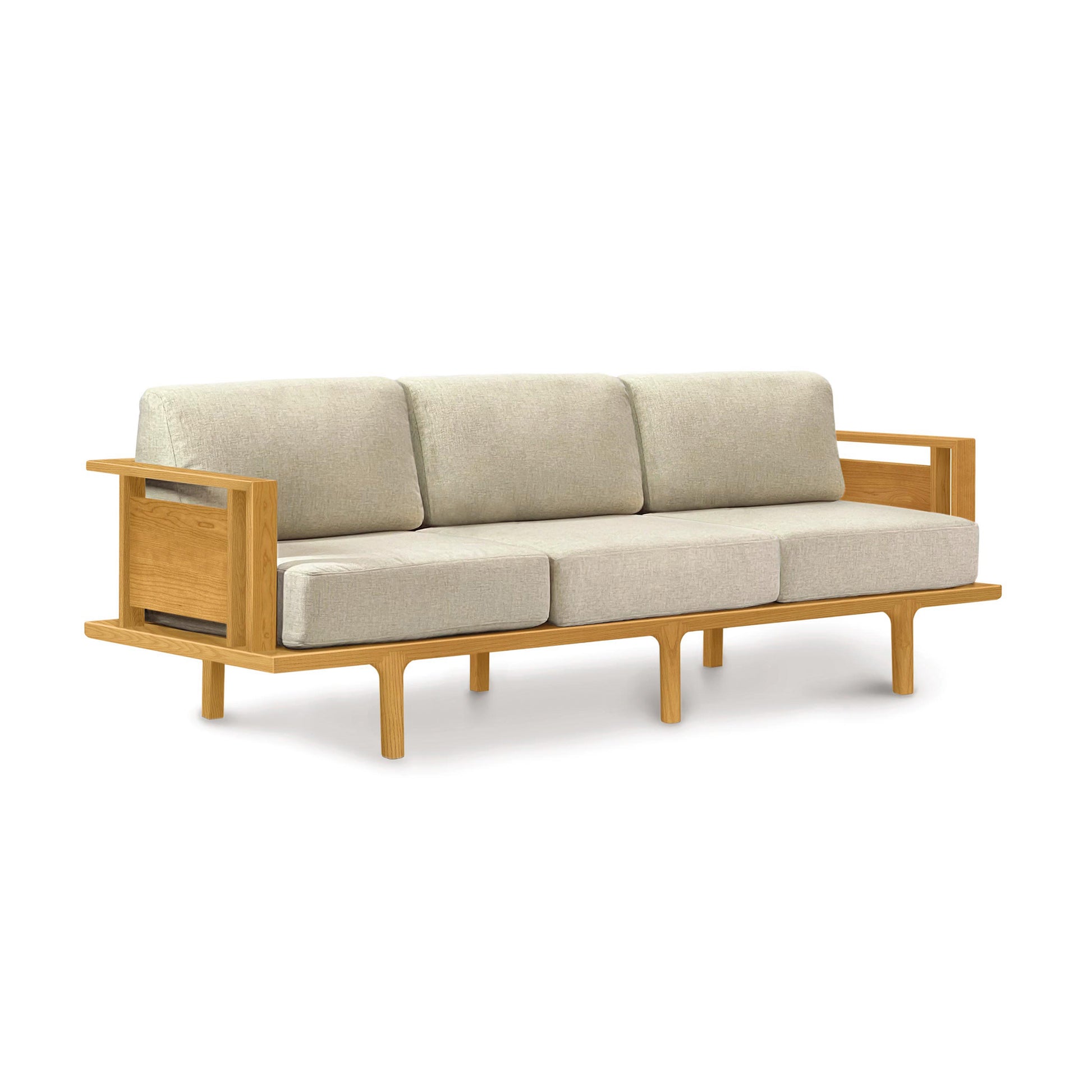 Modern handcrafted Copeland Furniture Sierra Sofa with a light wood frame, three beige cushions, and rectangular armrests.