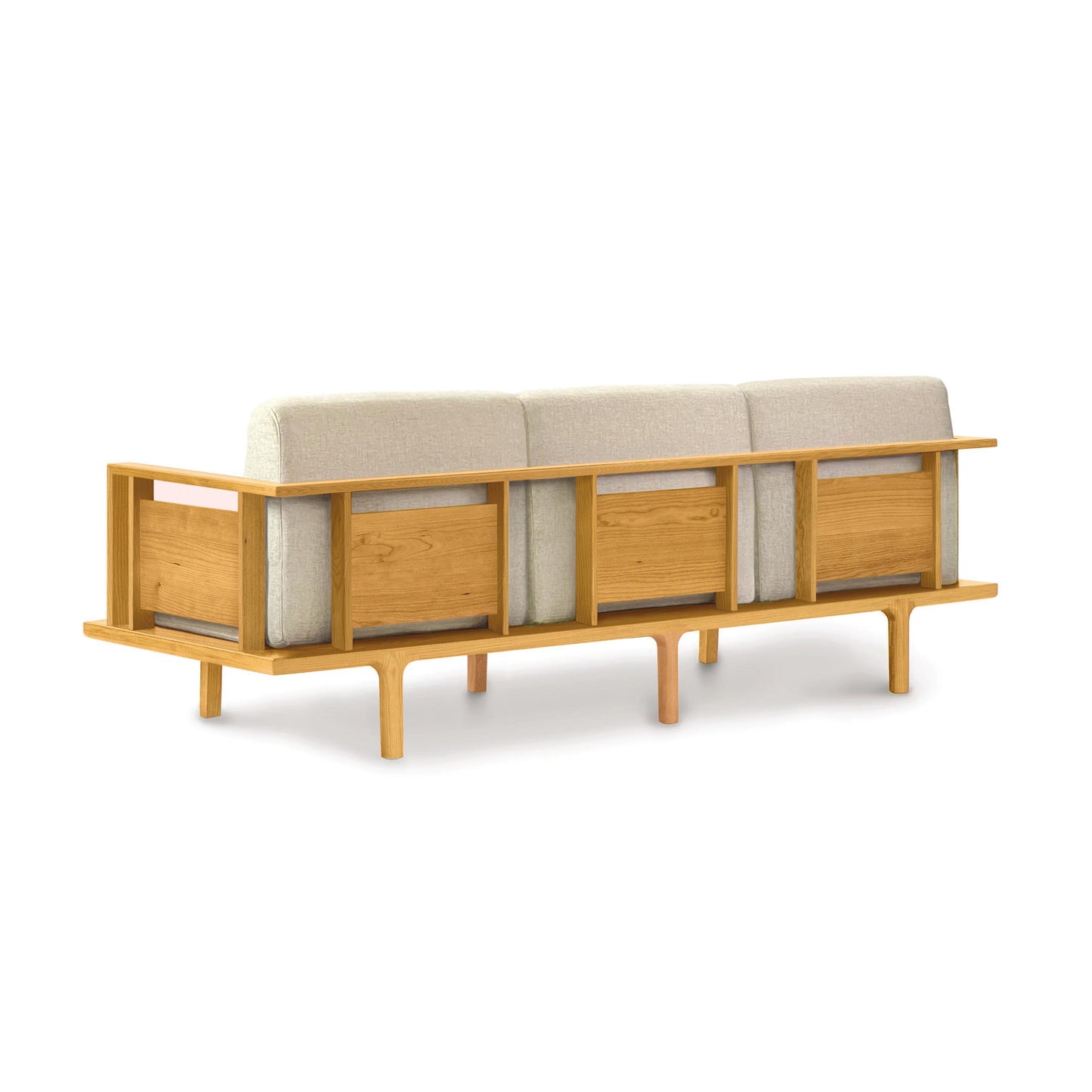 Sierra Upholstered Sofa by Copeland Furniture with minimalist rear view, beige cushions, and open square frame.