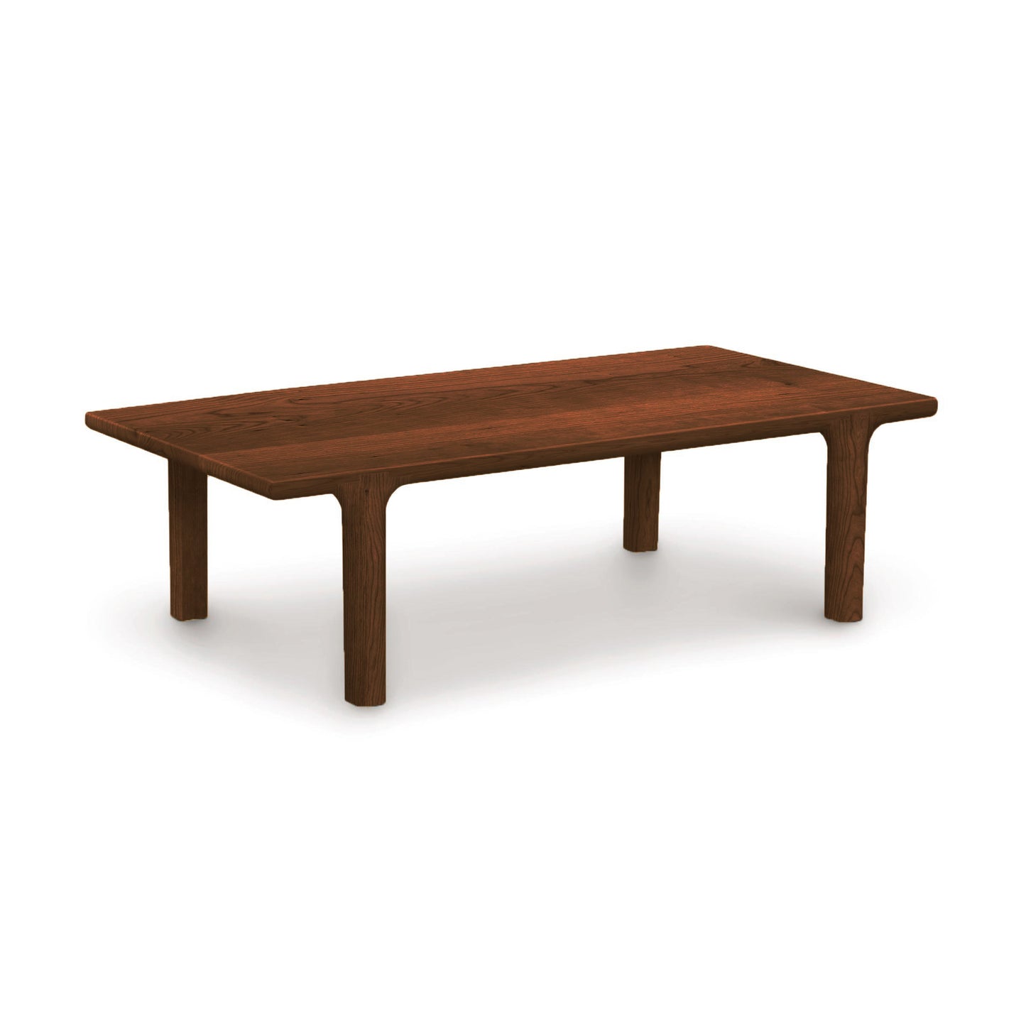 Sierra Rectangular Coffee Table by Copeland Furniture crafted from dark brown North American hardwood, highlighting elegant wood grain and modern design.