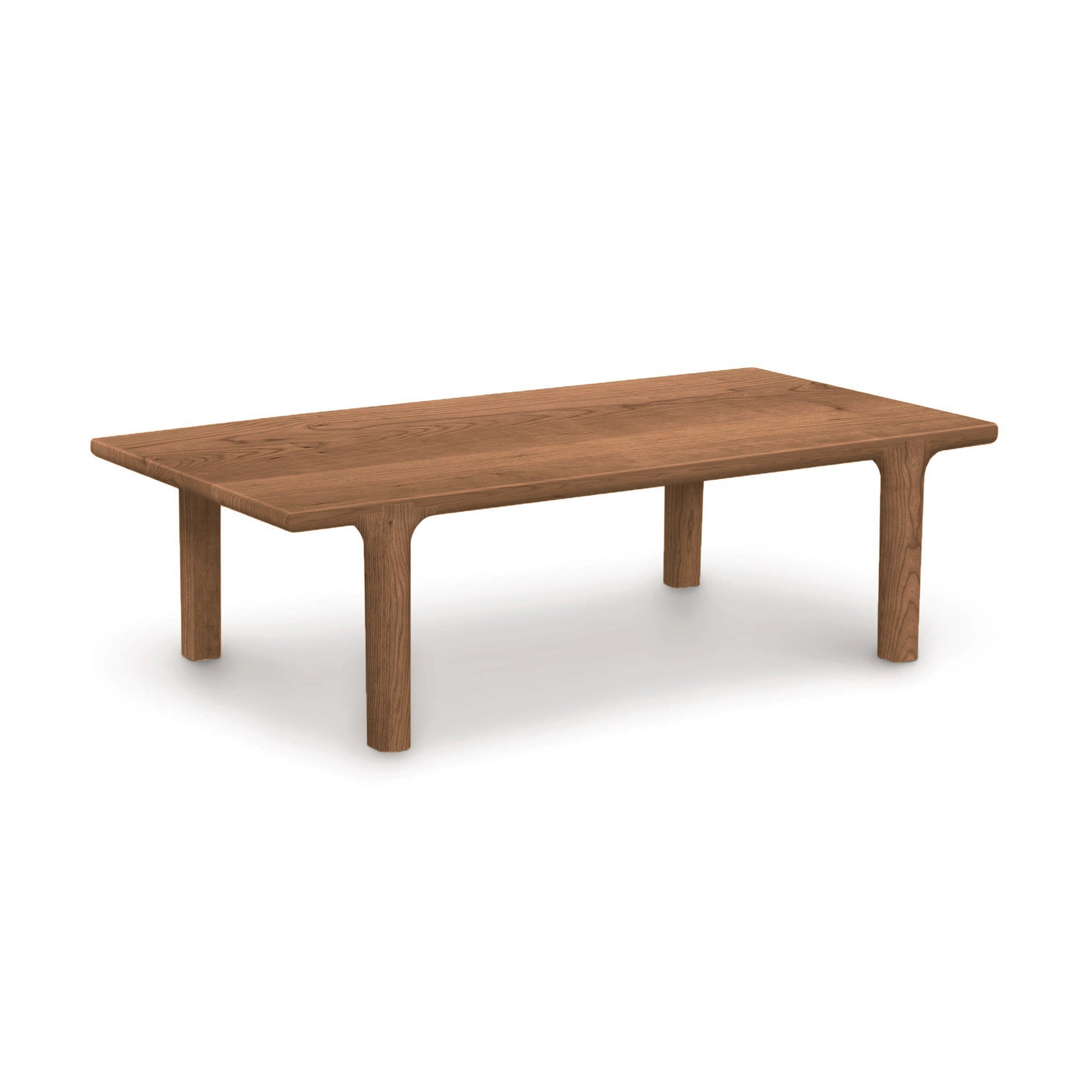 Sierra Rectangular Coffee Table by Copeland Furniture, crafted from North American hardwood with a flat top and sturdy legs, shown in a customizable wood finish.