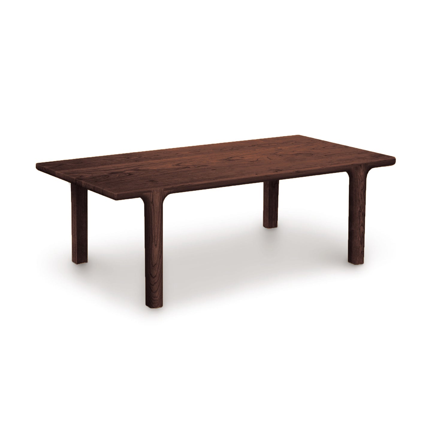 Sierra Rectangular Coffee Table by Copeland Furniture, handcrafted from North American hardwood with customizable finishes, shown in a simple setting.