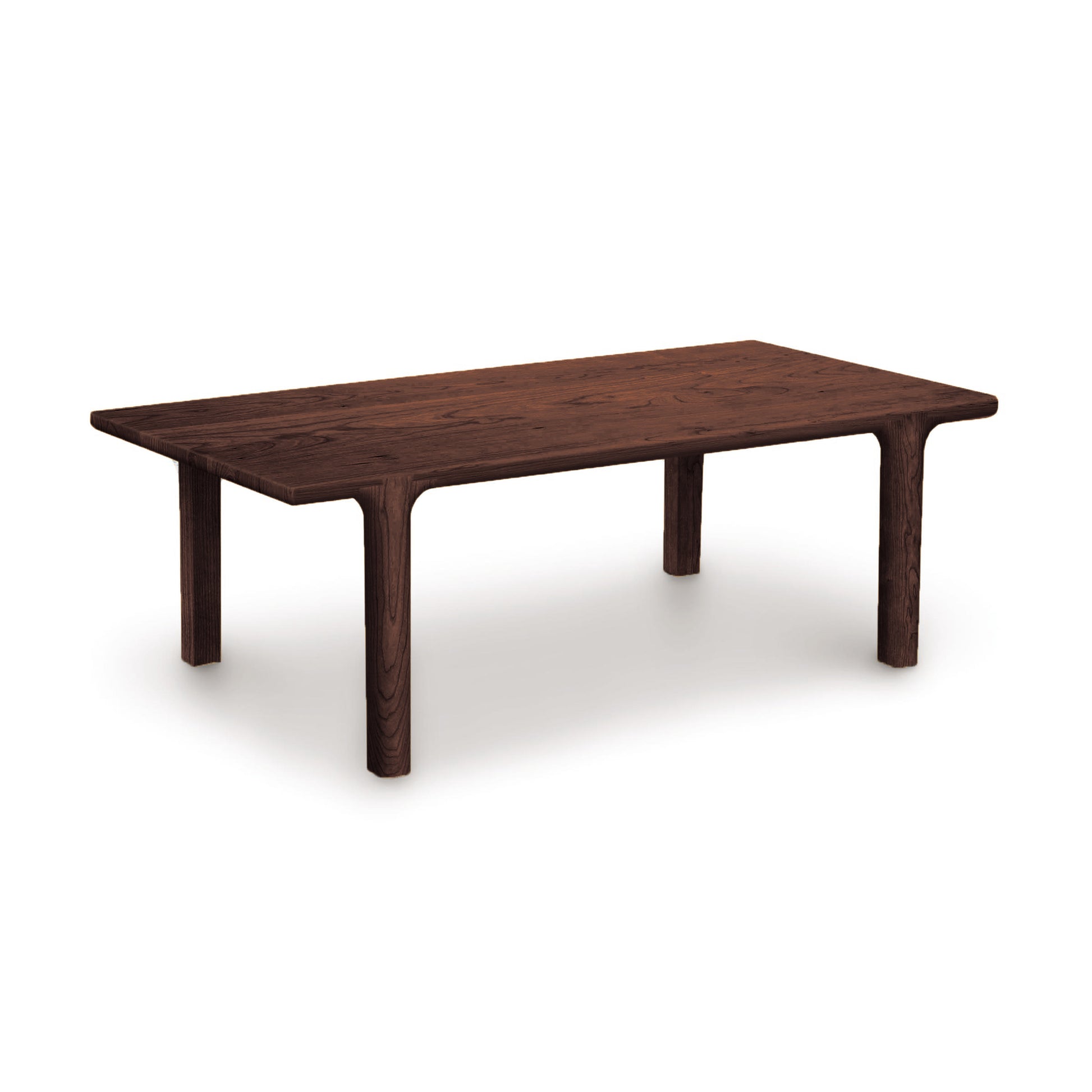 Sierra Rectangular Coffee Table by Copeland Furniture, handcrafted from North American hardwood with customizable finishes, shown in a simple setting.