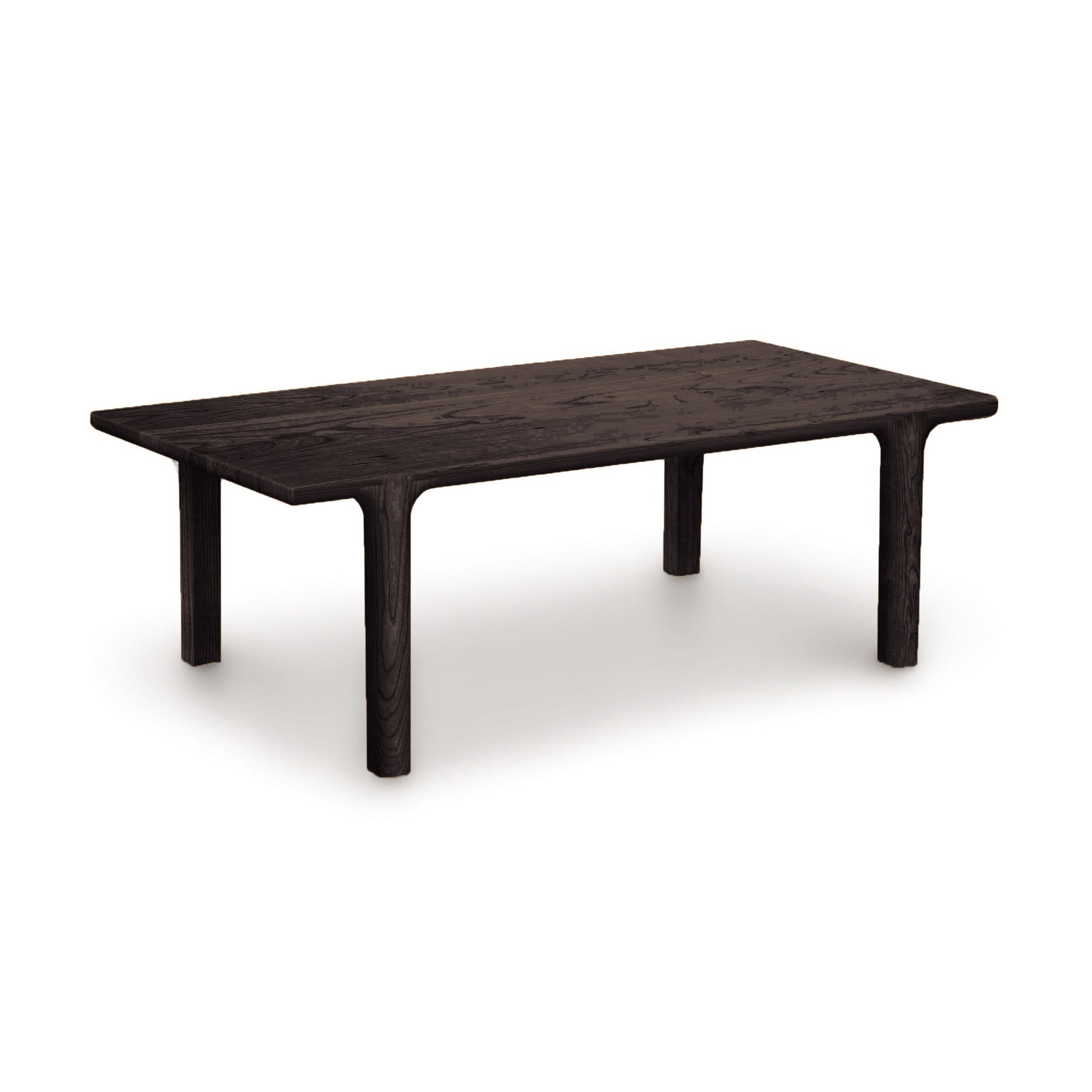 Sierra Rectangular Coffee Table by Copeland Furniture, crafted from dark North American hardwood, highlighting its sleek design and rich wood grain.