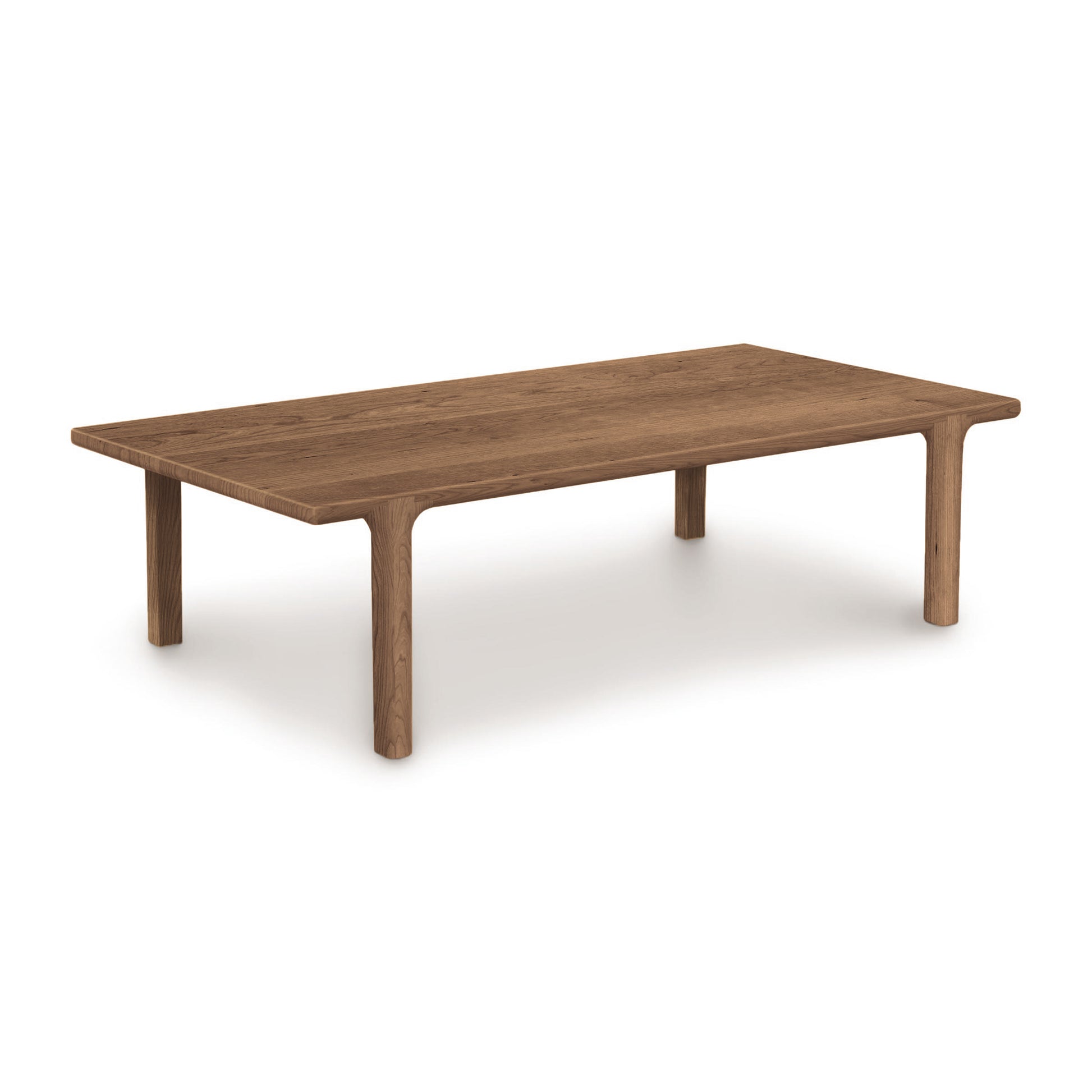 Sierra Rectangular Coffee Table by Copeland Furniture made of North American hardwood with rounded legs and a smooth finish.