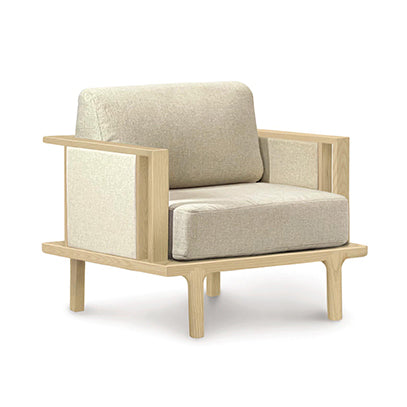 Beige Sierra Upholstered Chair by Copeland Furniture featuring a wooden frame, padded armrests, and modern design.