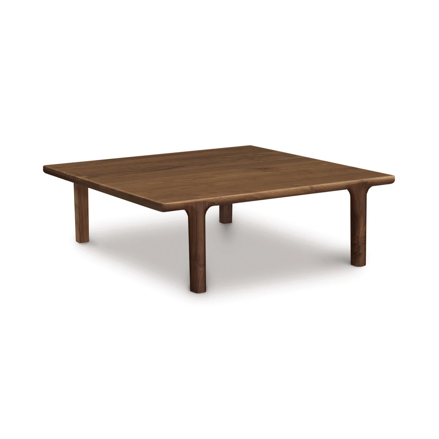 Sentence with replaced product:
A low-profile, Copeland Furniture Sierra Square Coffee Table crafted from North American hardwood, with simple tapered legs, isolated on a white background.