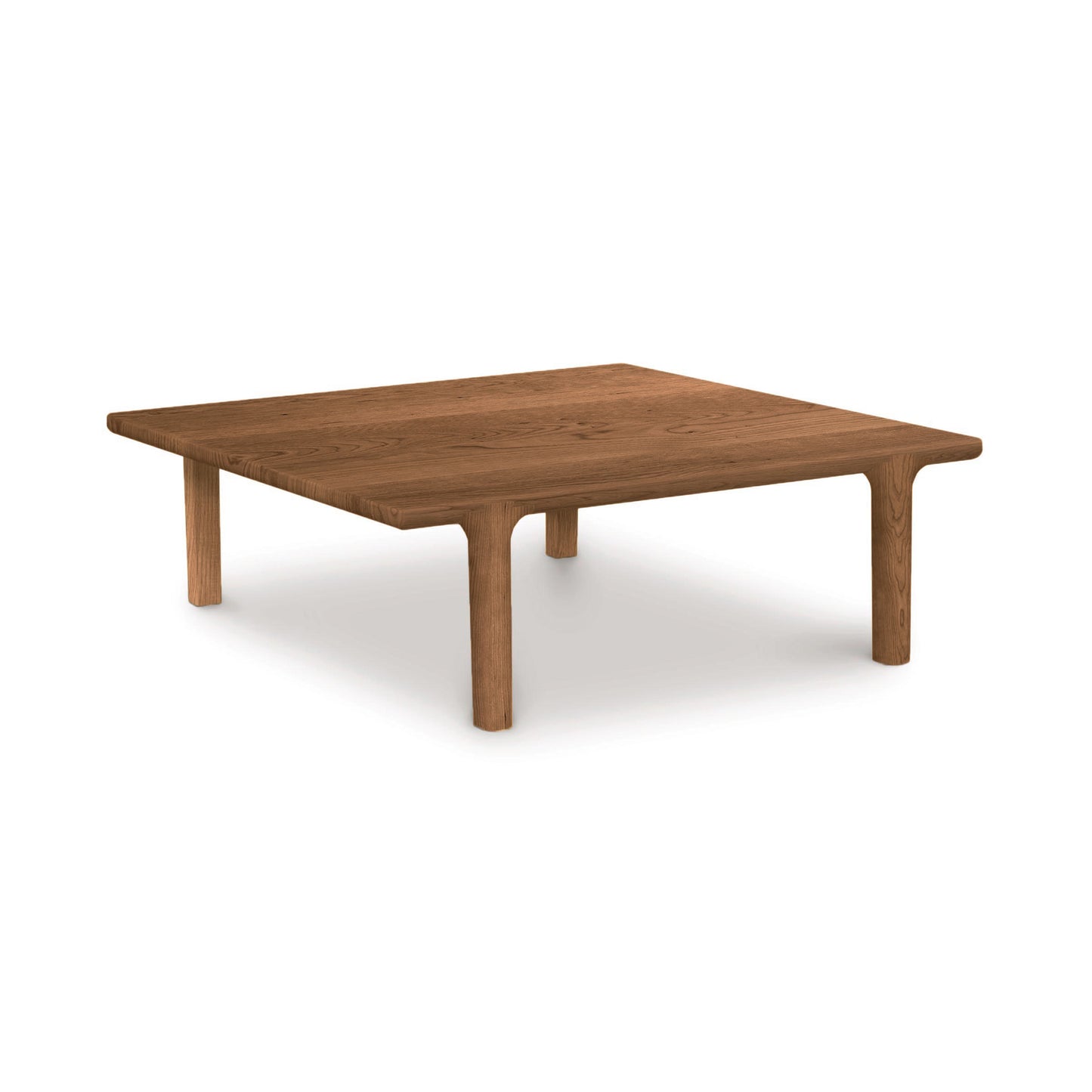 A wooden, low-profile Copeland Furniture Sierra Square Coffee Table with a contemporary design set against an isolated background.