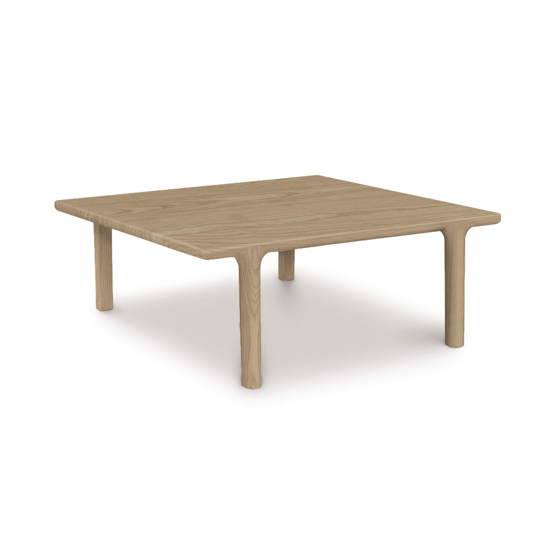 A contemporary design Copeland Furniture Sierra Square Coffee Table, crafted from North American hardwood, with square edges and four sturdy legs on a white background.