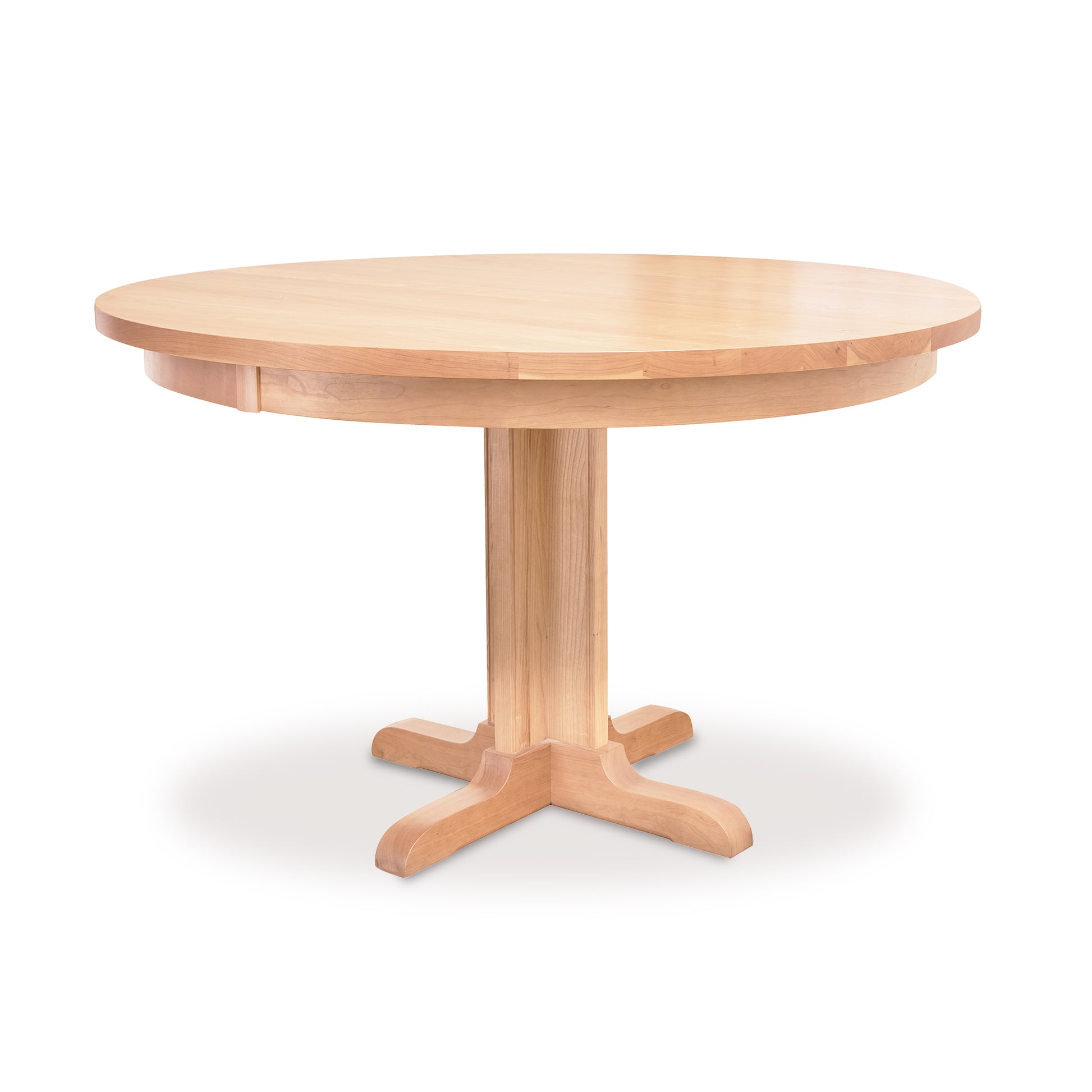 A sturdy Single - Leg Round Pedestal Table with a solid wooden base by Lyndon Furniture.