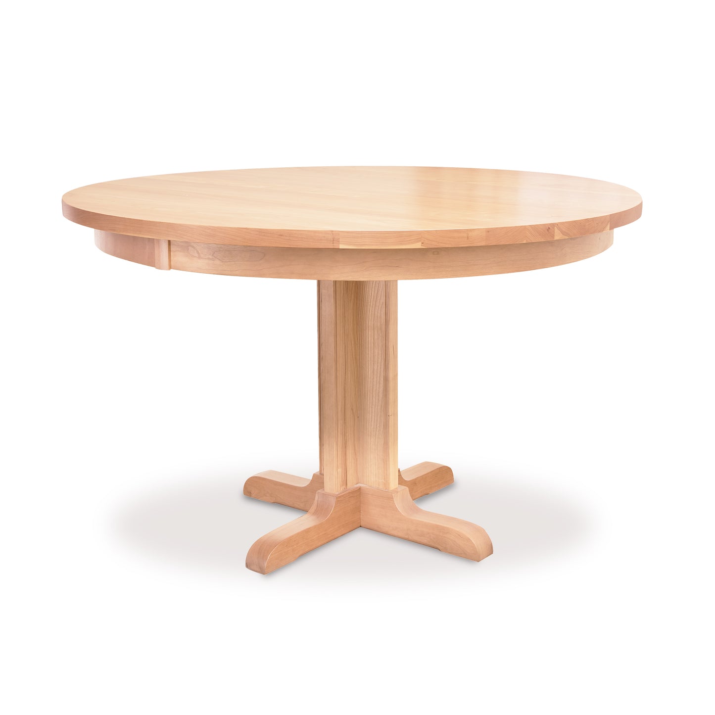 Lyndon Furniture Single-Leg Round Pedestal Table crafted in natural cherry with a solid top, highlighting its elegant pedestal base.