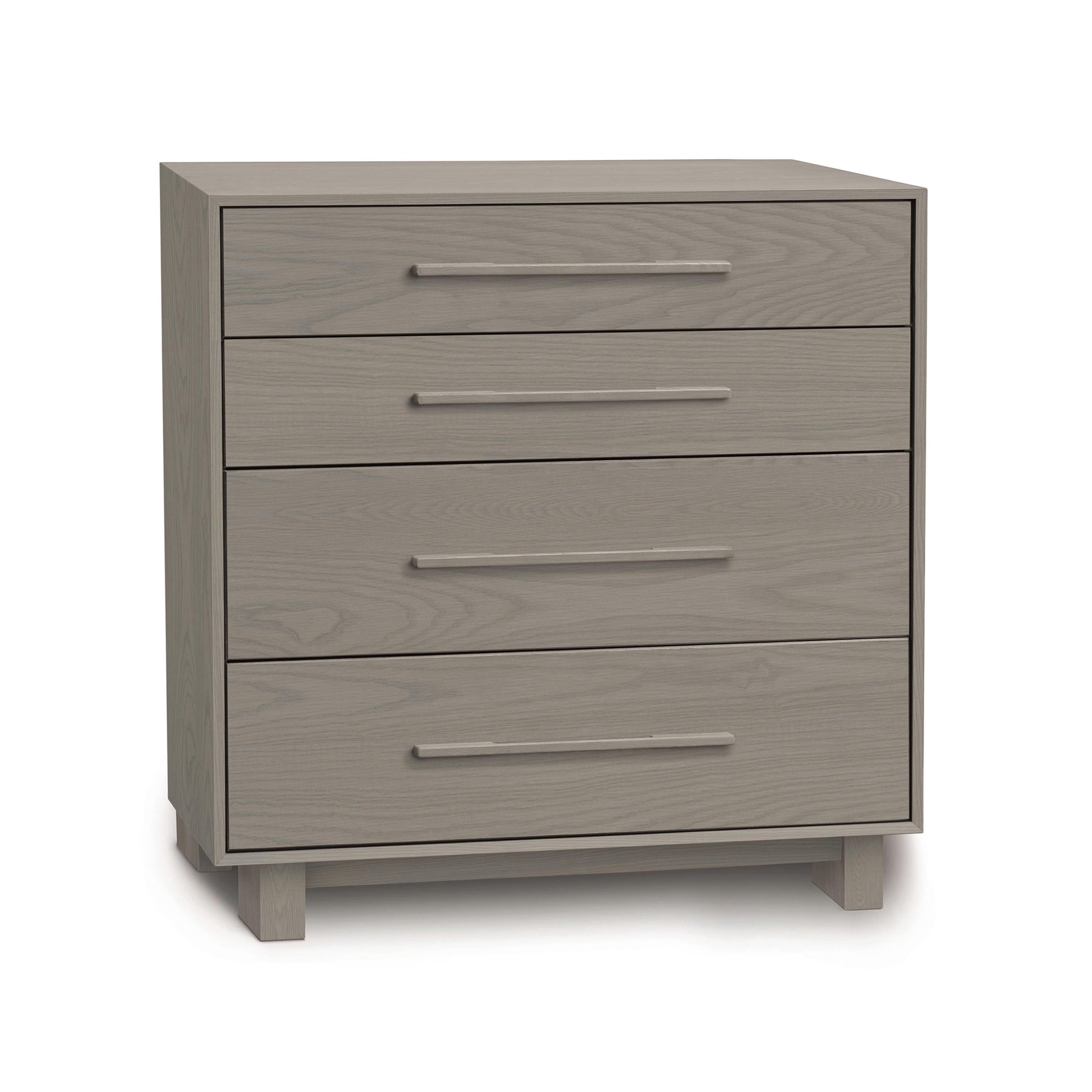 Sloane 4-Drawer Chest by Copeland Furniture showcasing natural American hardwood in a light gray finish with silver handles.