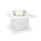 A white square POLYWOOD Square 42" Fire Pit Table fire pit table with a visible flame under a glass wind guard, set against a plain white background, perfect for enhancing outdoor ambiance.