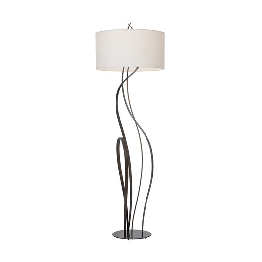 Sway Floor Lamp by Hubbardton Forge featuring hand-forged steel rods and a white drum shade, crafted in Vermont for modern American interiors.