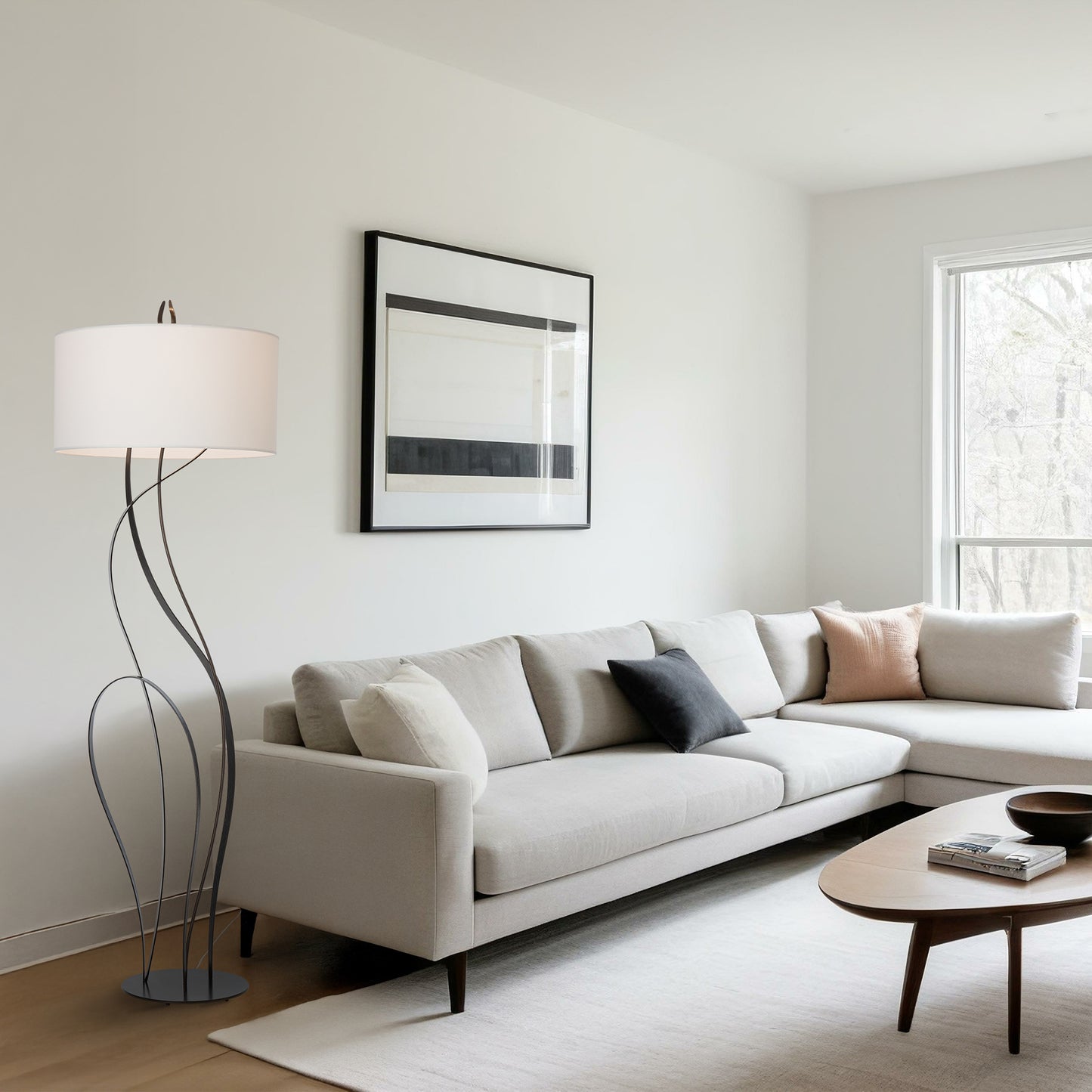 Beige sectional sofa and coffee table, both crafted from high quality American hardwoods, as the focal point of a stylish modern living room.