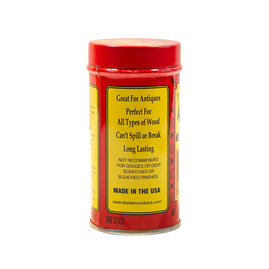 A tin can with a red label on it.