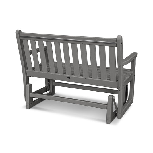 Grey POLYWOOD Traditional Garden 48" Glider Bench with slatted back and seat, crafted from recycled plastic lumber, rear angle view.