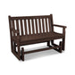 A POLYWOOD Traditional Garden 48" Glider Bench in a dark brown finish, isolated on a white background. The bench has a slatted back and seat with armrests on each side.