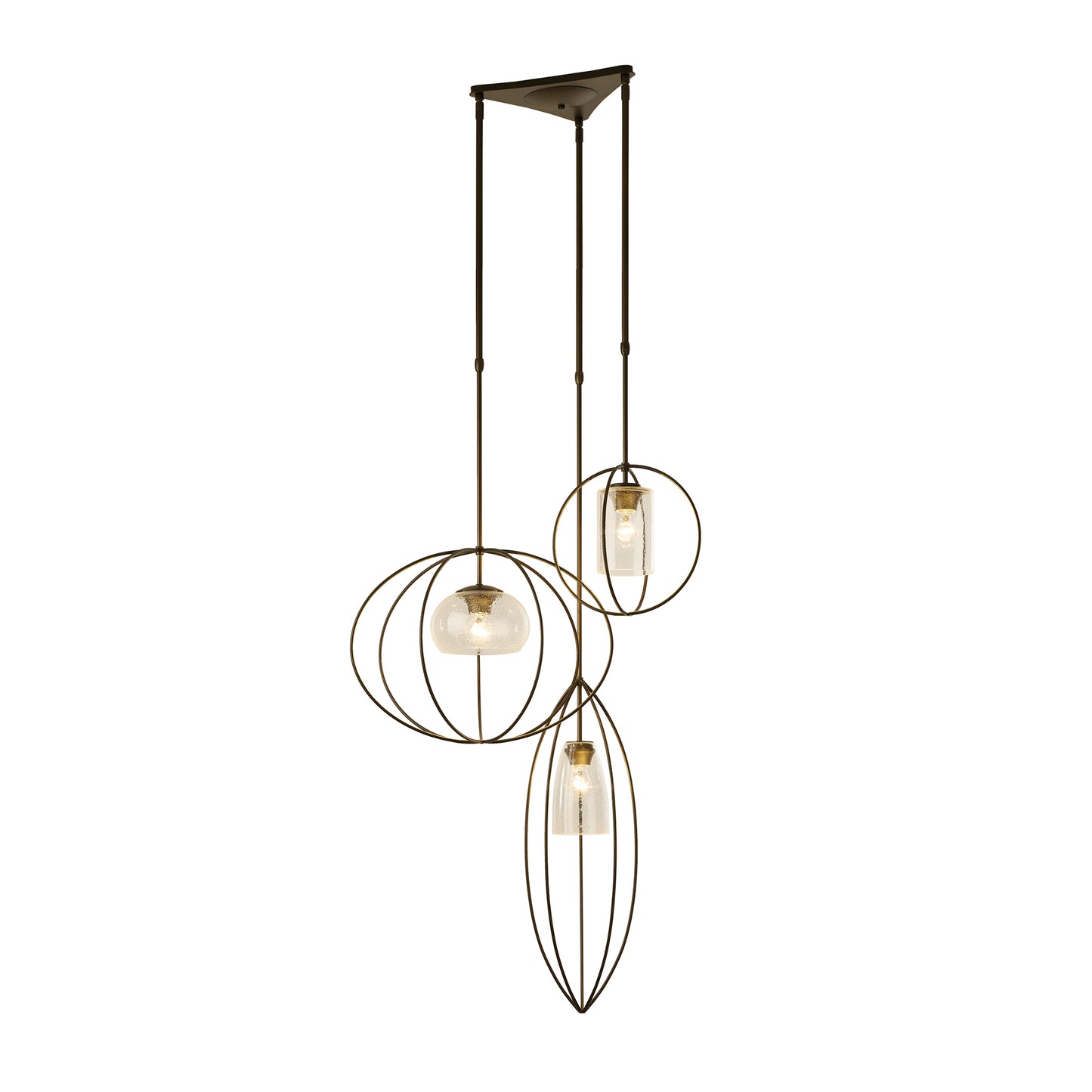 Three Treble Pendant light fixtures by Hubbardton Forge hanging from a ceiling.