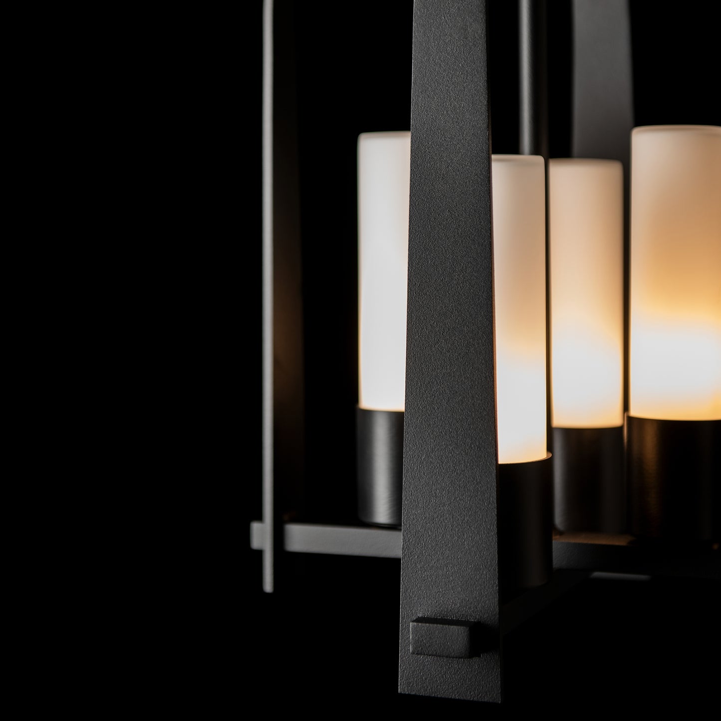 Triomphe Outdoor Lantern by Hubbardton Forge in Coastal Black, featuring frosted glass shades and expert American craftsmanship.
