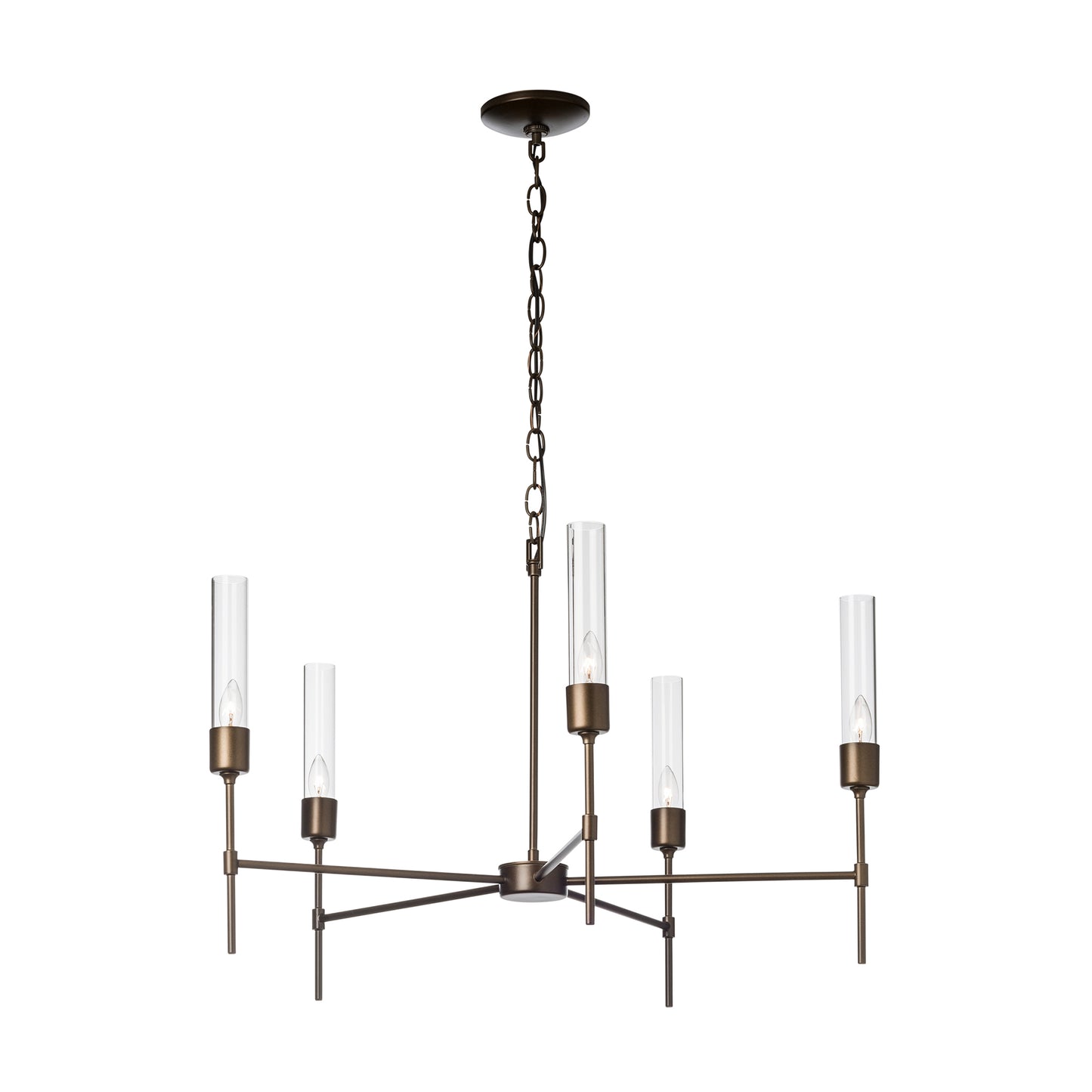 A Hubbardton Forge Vela 5-Arm Chandelier with four lights and a glass shade.
