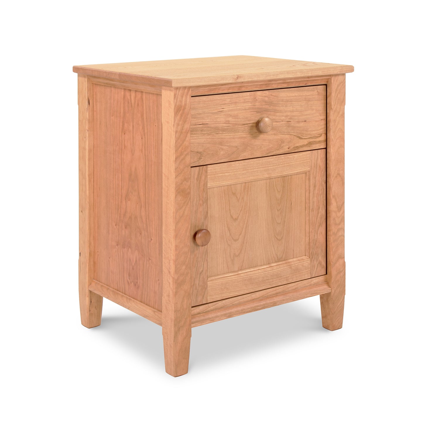 Vermont Shaker 1-Drawer Nightstand with Door by Maple Corner Woodworks, crafted from eco-friendly wood with natural grain, featuring a single drawer and cabinet door with simple round handles.