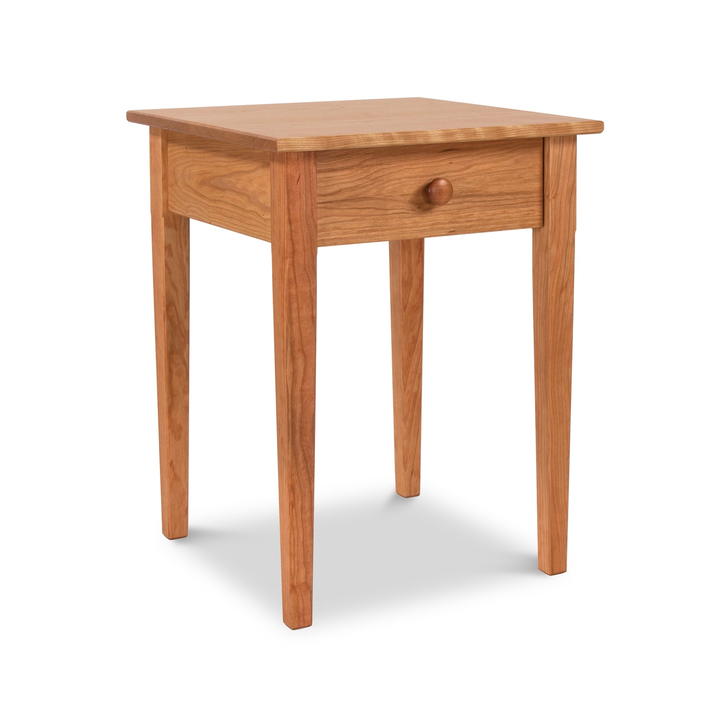 Vermont Shaker Bedside Table by Maple Corner Woodworks, featuring a square top, four sturdy legs, and a single drawer with a round knob, crafted from sustainably harvested solid woods.