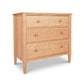 A Vermont Shaker 4-Drawer Chest in solid cherry wood with a natural finish, standing on angled legs, isolated on a white background. The dresser features round knobs on each drawer. (Brand Name: Maple Corner Woodworks)