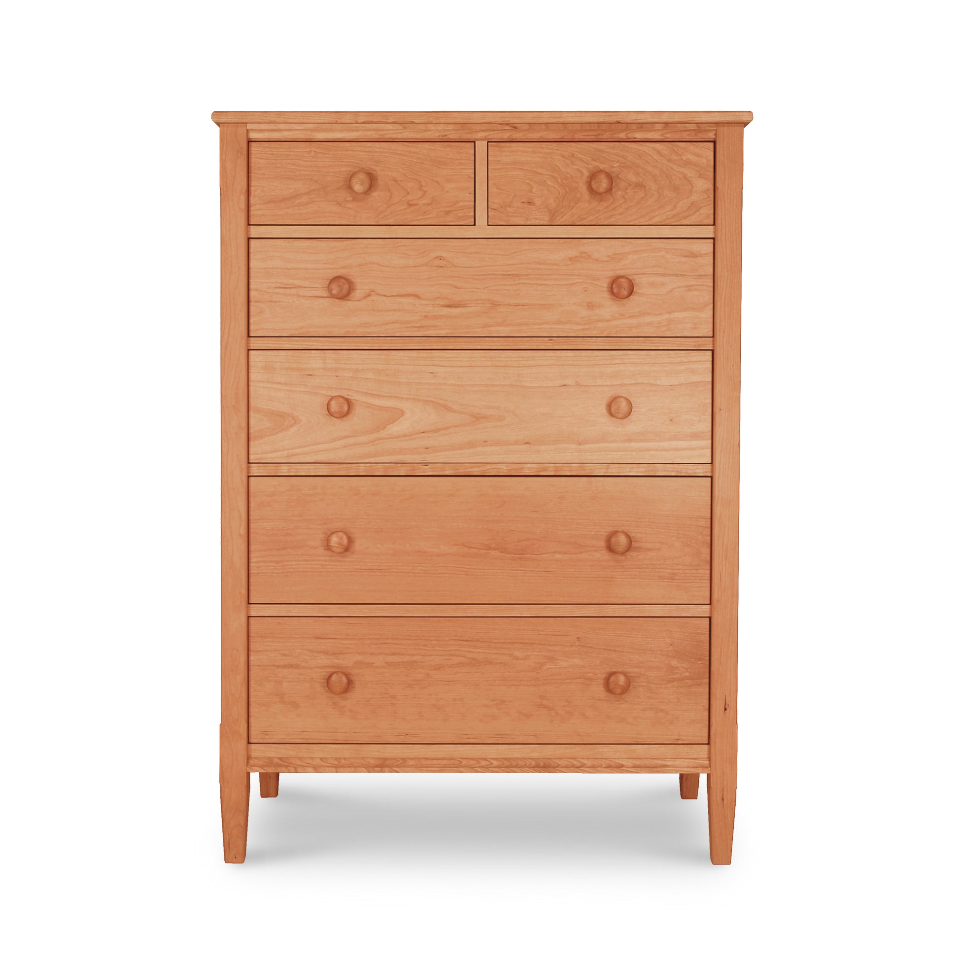 A Vermont Shaker 6-Drawer Chest by Maple Corner Woodworks with a simple design, featuring round knobs on each drawer, isolated on a white background, ideal for bedroom storage.