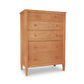 A Vermont Shaker 6-Drawer Chest from Maple Corner Woodworks with six drawers, featuring round knobs and a smooth, natural cherry finish. The furniture stands upright against a plain white background.