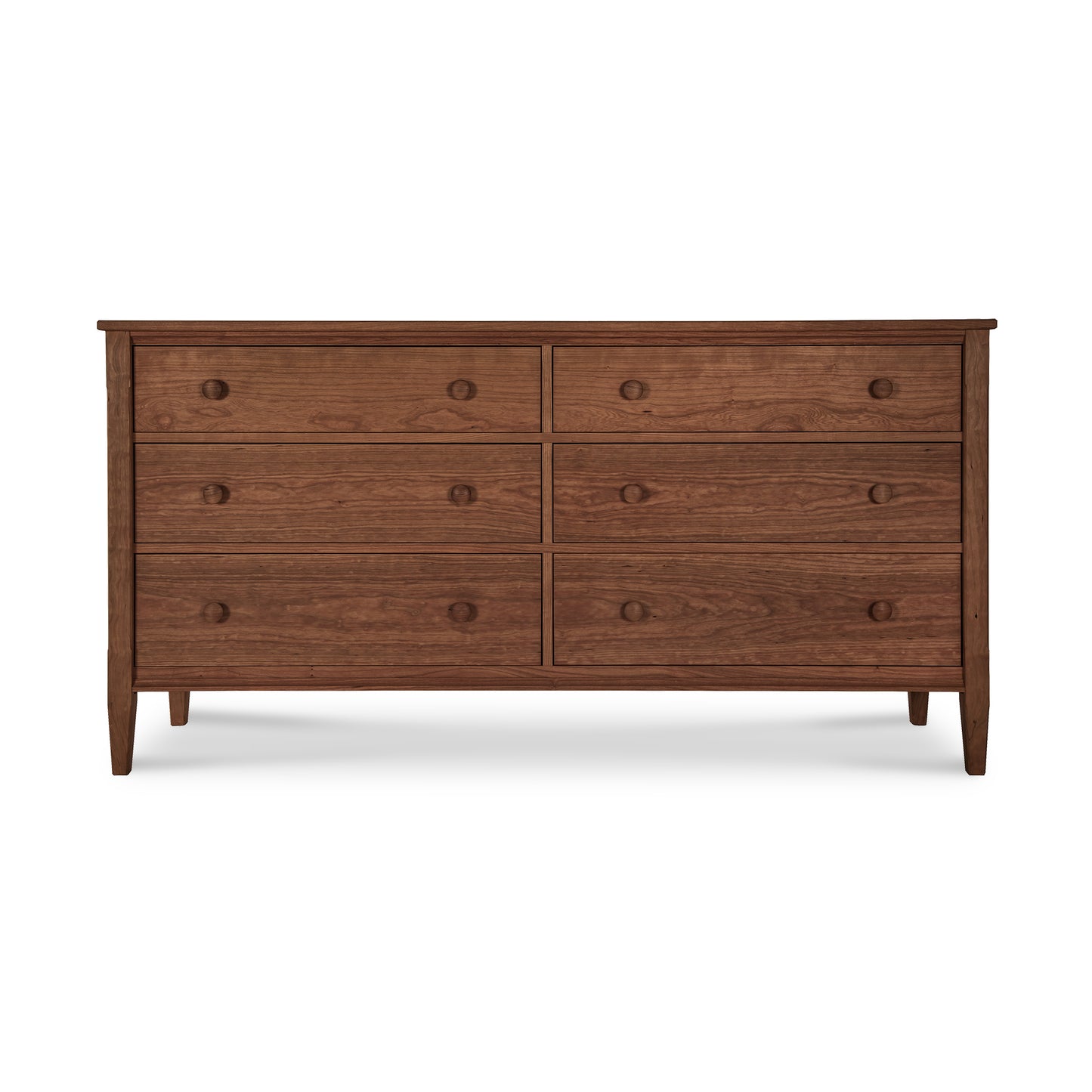 A Vermont Shaker 6-Drawer Dresser by Maple Corner Woodworks, featuring a symmetrical design and round knobs, isolated on a white background.