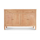 A Vermont Shaker Large 60" Sideboard by Maple Corner Woodworks featuring three drawers aligned horizontally at the top and three doors underneath with vertical wood grain patterns, set against a solid white background.