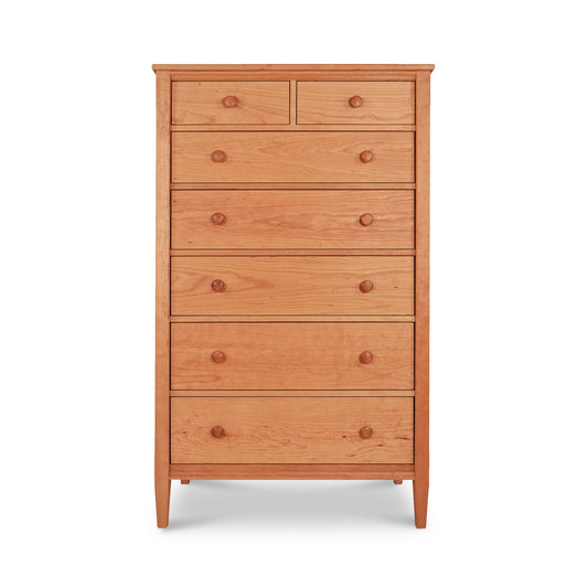 Vermont Shaker 7-Drawer Chest in cherry hardwood with round wooden knobs and natural finish.