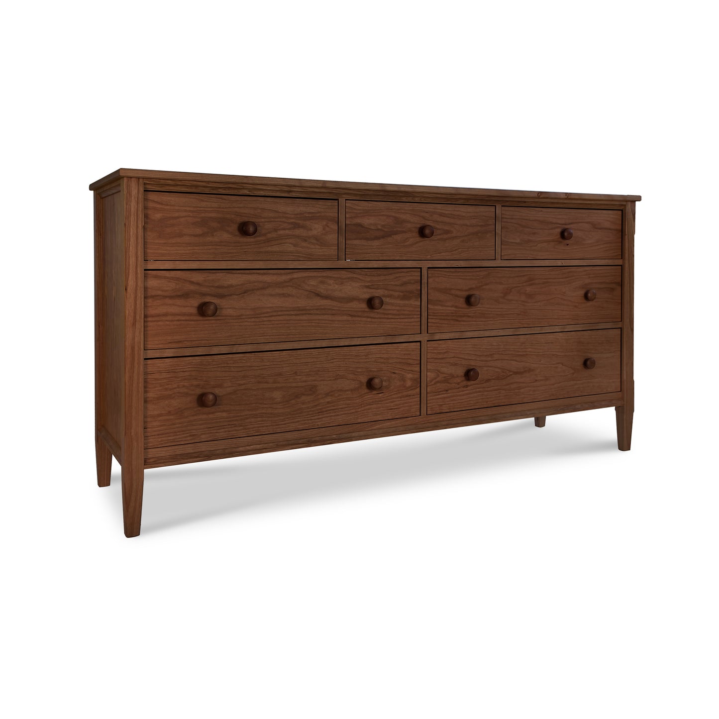 Vermont Shaker 7-Drawer Dresser by Maple Corner Woodworks featuring clean lines and four tapered legs, showcasing American craftsmanship.