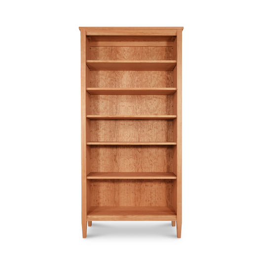 A Maple Corner Woodworks Vermont Shaker Bookcase crafted from sustainably harvested hardwoods, with empty shelves against a white background.