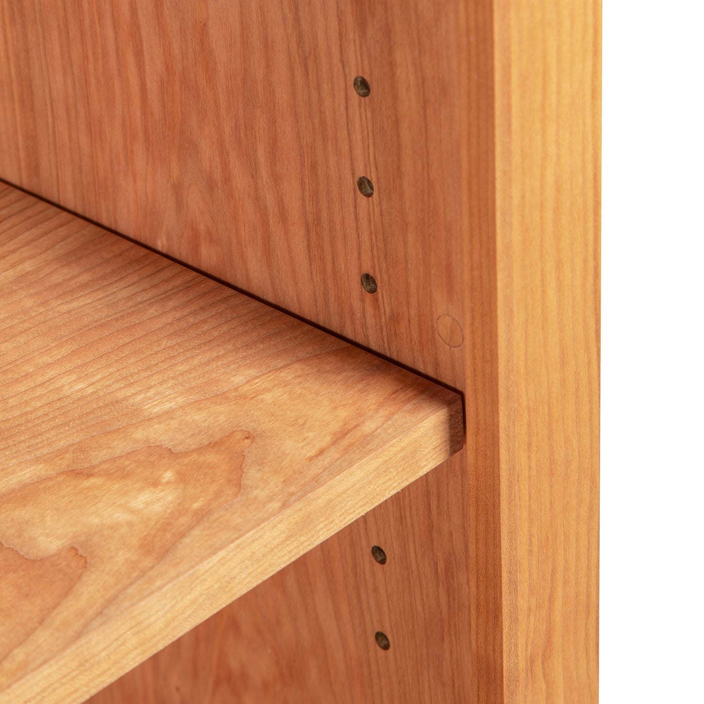 Vermont Shaker 37" Bookcase by Maple Corner Woodworks showcasing adjustable shelf with precise pegs and drill holes.
