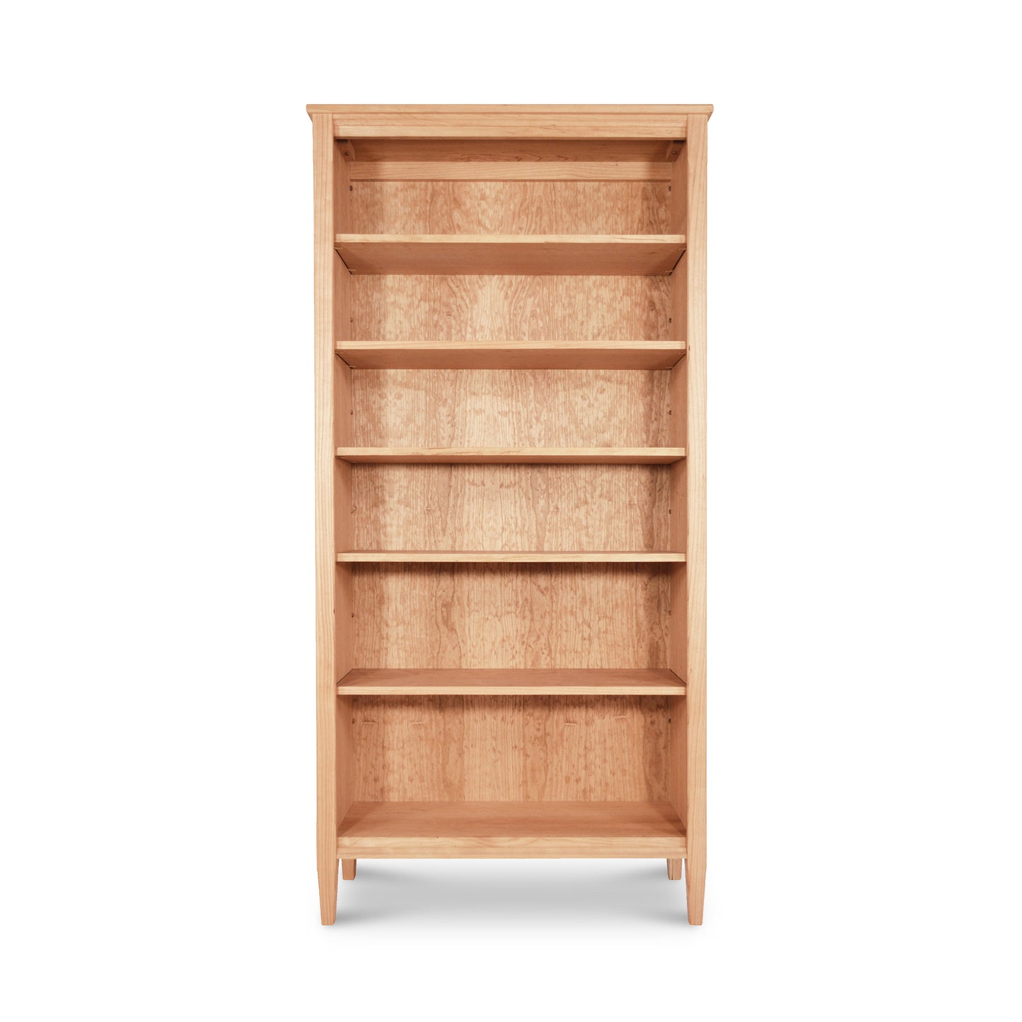 Vermont Shaker Bookcase by Maple Corner Woodworks, a tall wooden bookshelf with five shelves made from sustainably harvested hardwoods, shown empty against a white background. Part of the Vermont Shaker Furniture Collection.