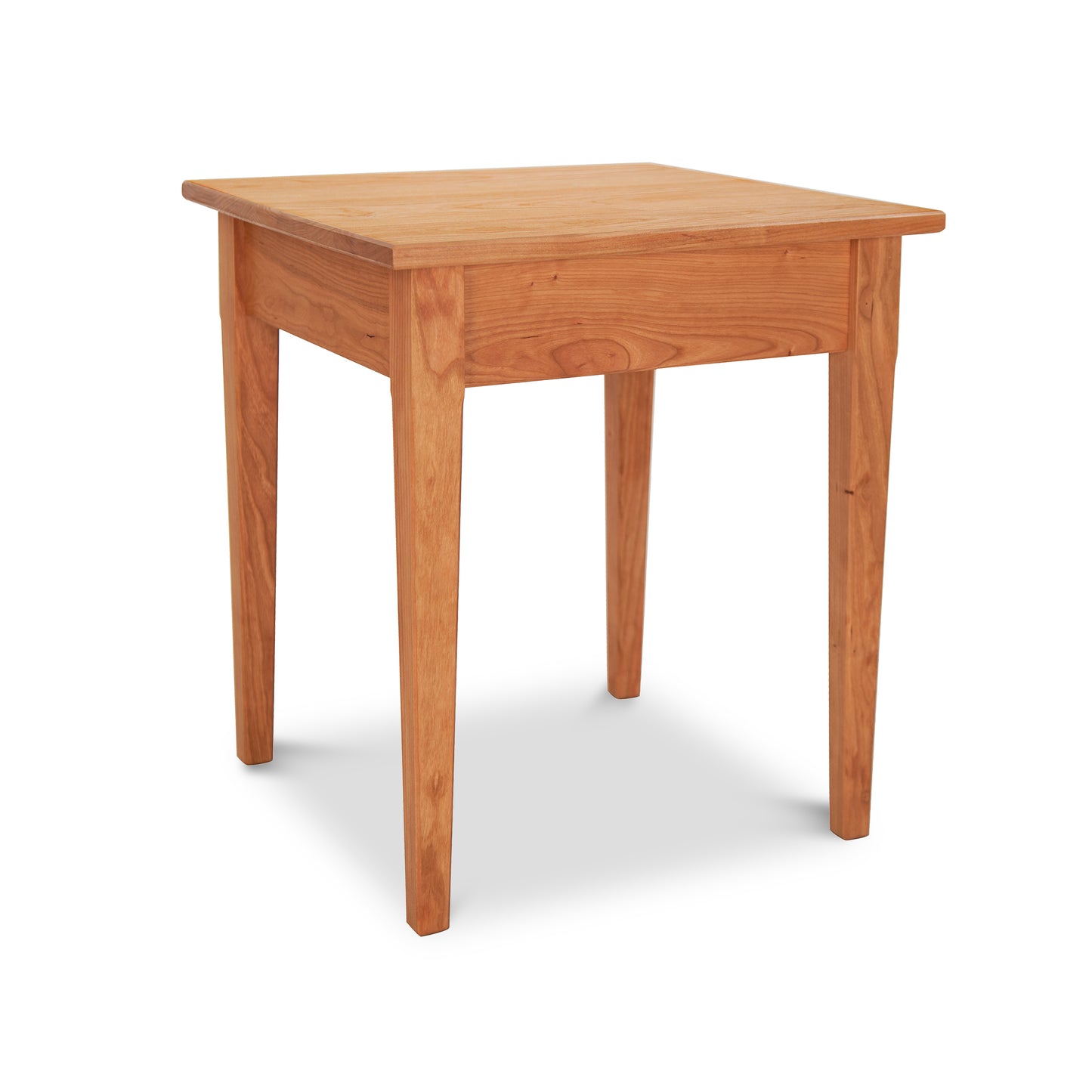 A Vermont Shaker End Table crafted from sustainably harvested hardwoods by Maple Corner Woodworks, with a smooth surface and four legs, isolated on a white background.