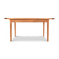A Maple Corner Woodworks Vermont Shaker Harvest Extension Dining Table with a smooth top and four straight legs, isolated on a white background.